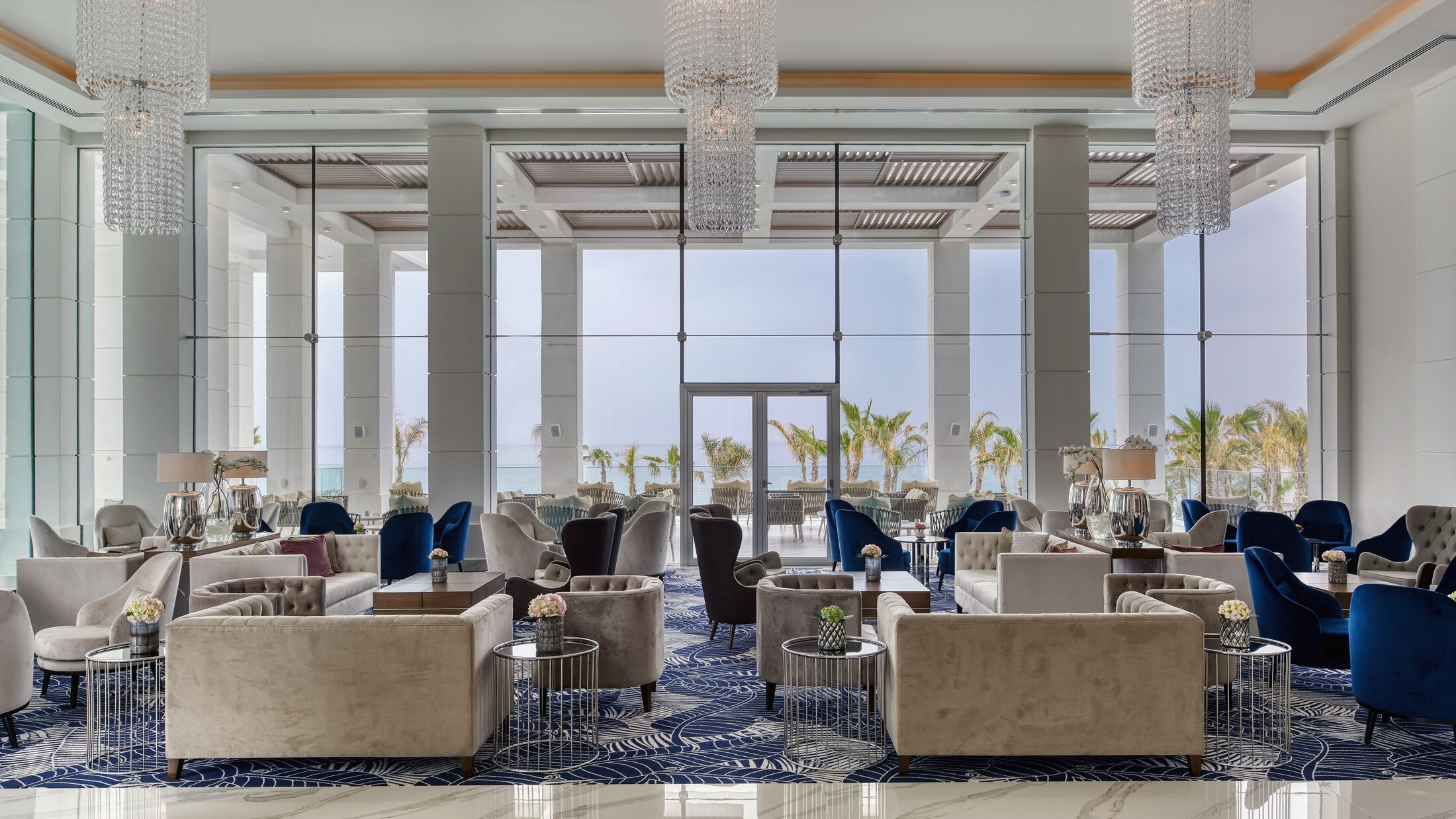 a room filled with furniture and a large window