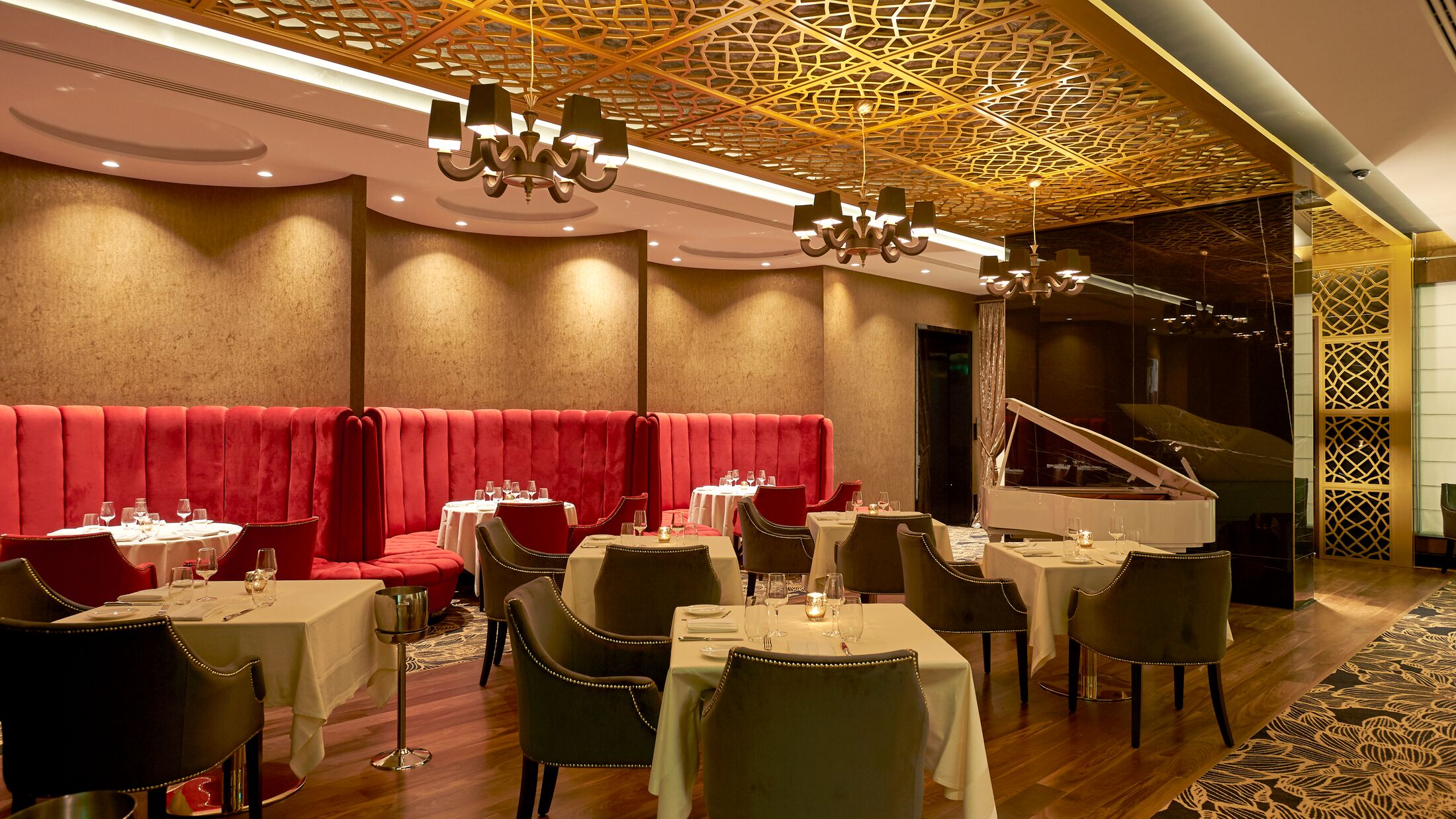 a room filled with furniture and a table in a restaurant