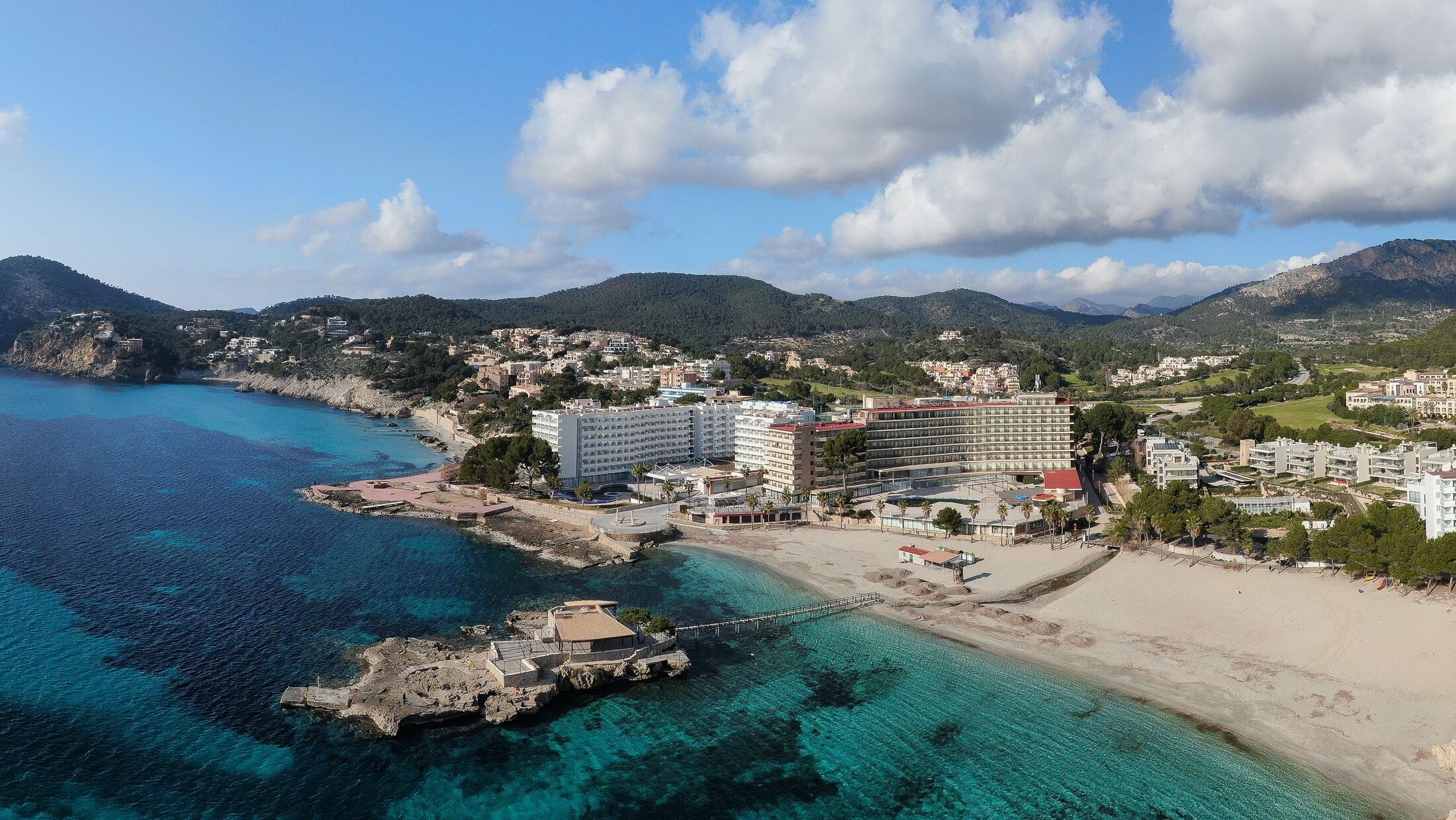 Panoramic view of Camp de Mar beach in the island of Majorca. Beautiful scene of the seacost with a blue sea and Mediterranean landscape