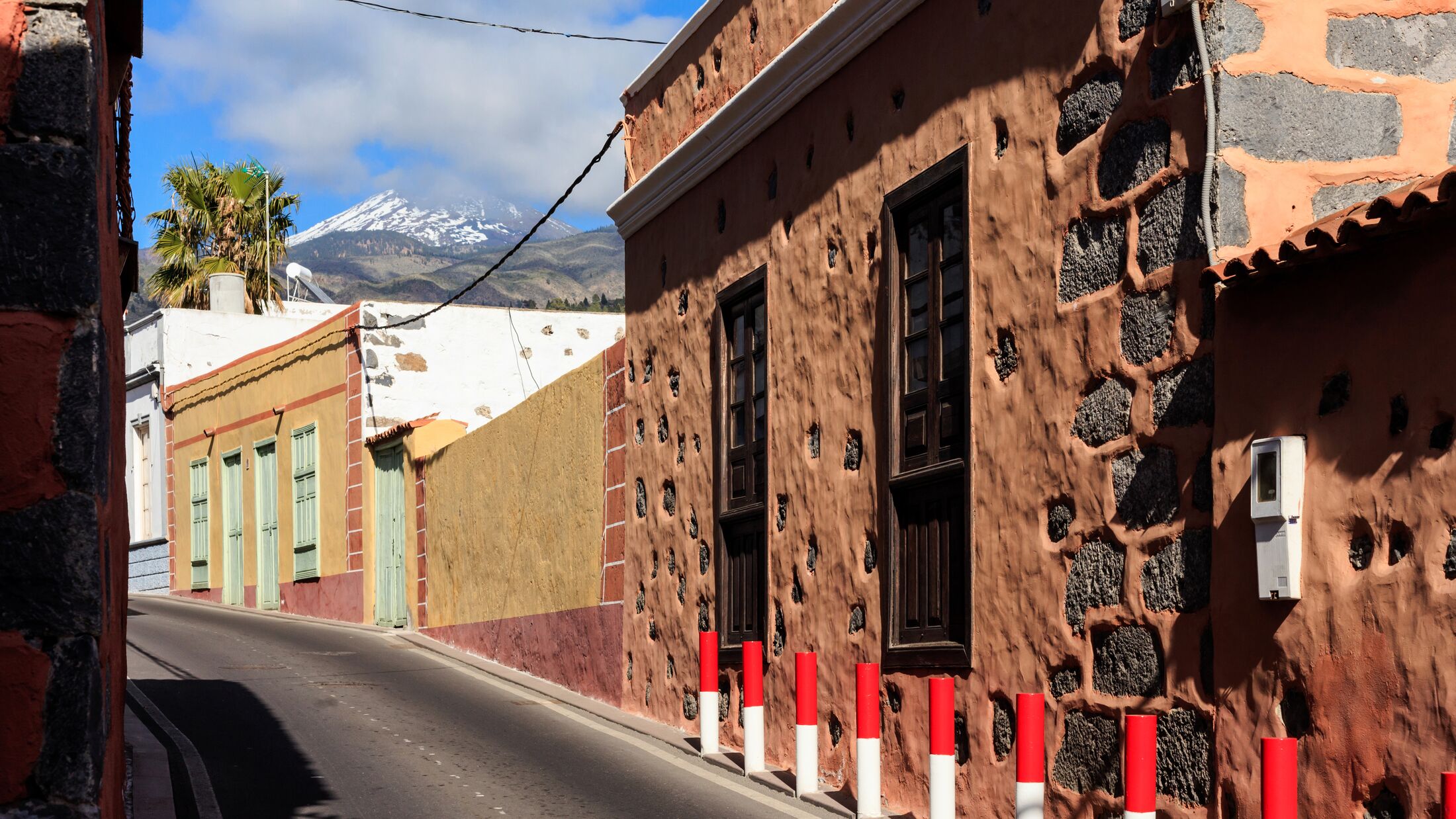 Summer cityscape on tropical island Tenerife, Canary in Spain. Street of old town Guia de Isora.