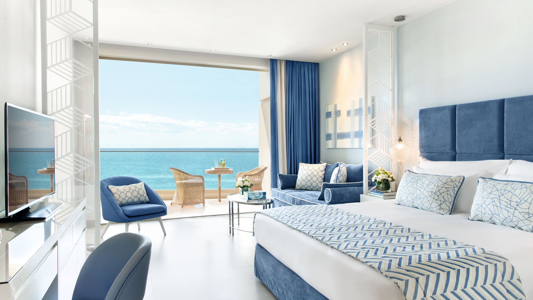 Ikos-Oceania-2023-Junior-Suite-Sea-View-002-119737-Hybris