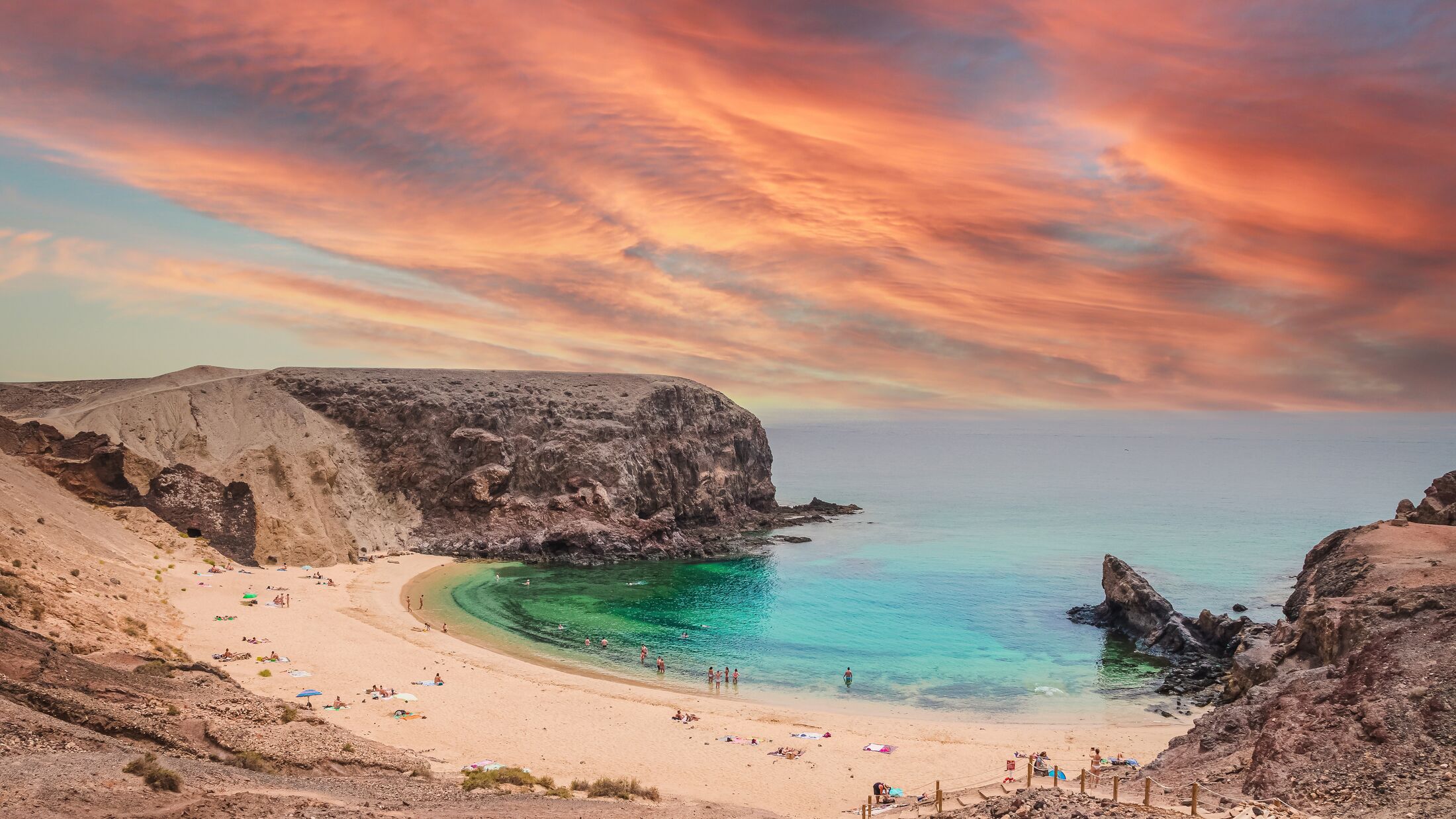 Beautiful sunset landscape with turquoise ocean water on Papagayo beach, Lanzarote, Canary Islands, Spain