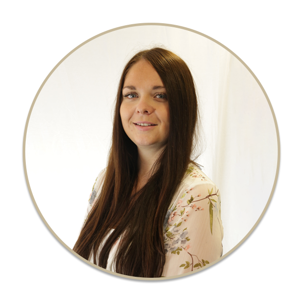 a woman standing in front of a mirror posing for the camera